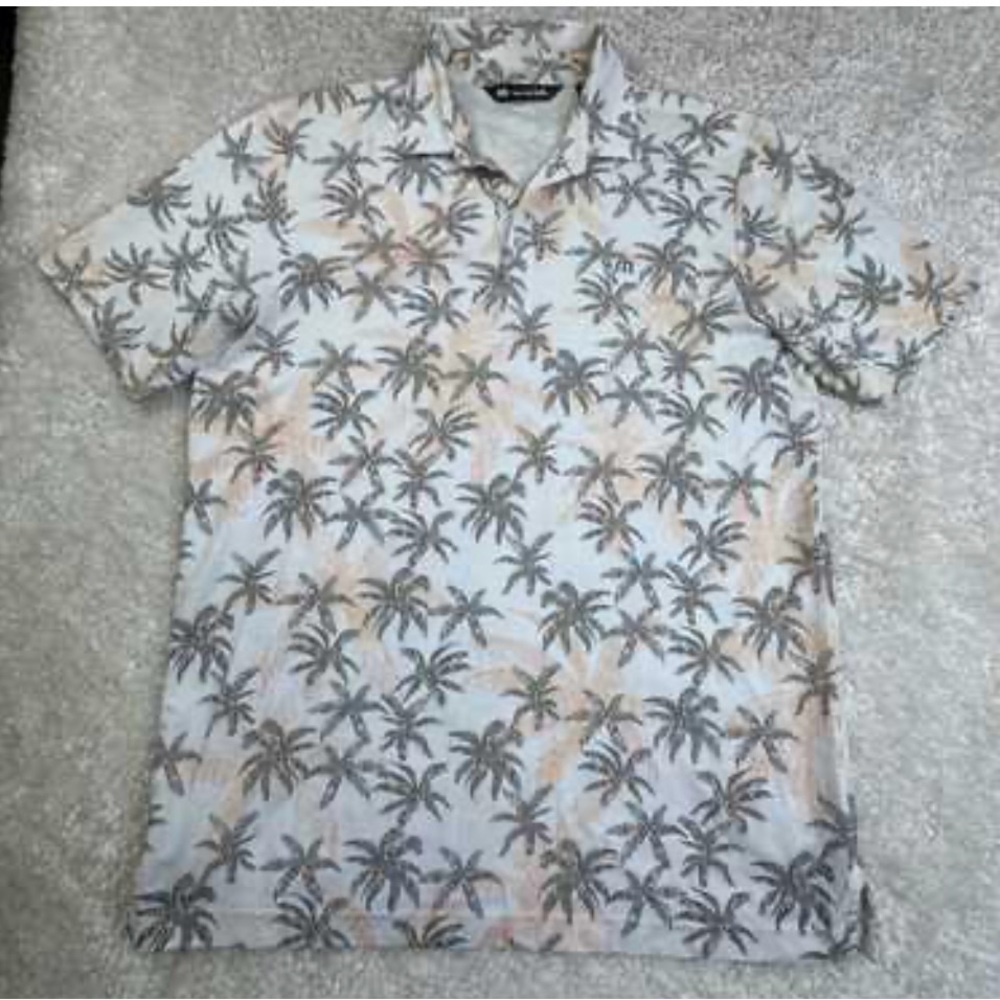 Travis Mathew’s floral golf shirt/small